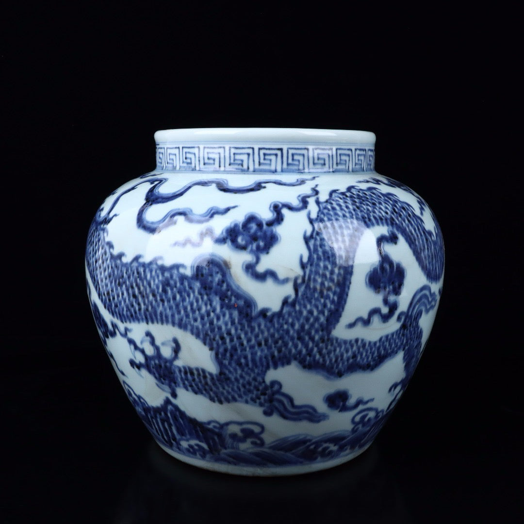 A pair of blue and white cloud dragon patterned jars