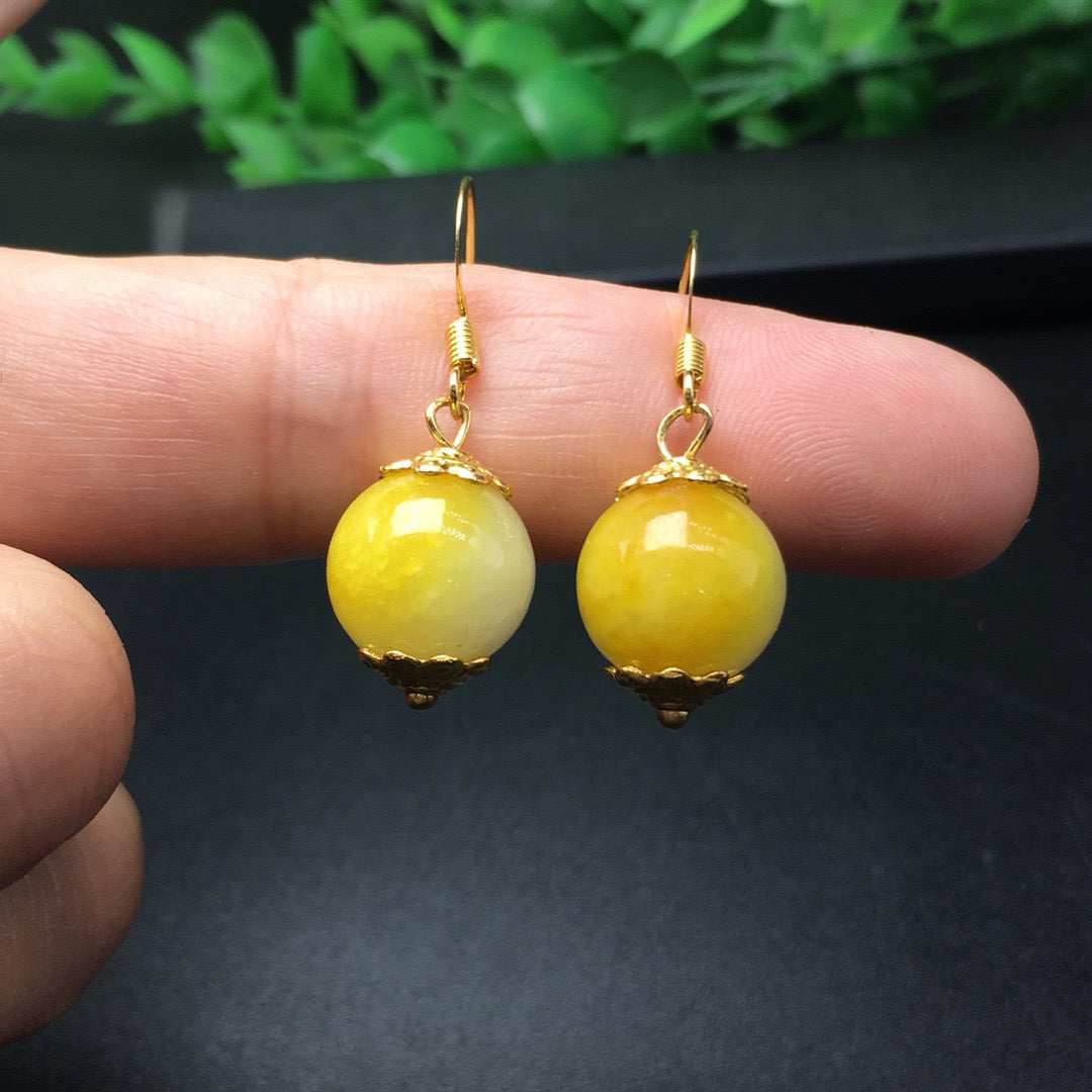 Sugar yellow round bead jade earrings