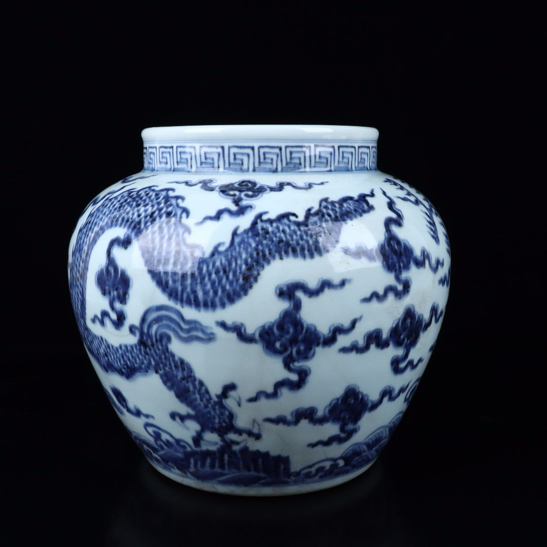 A pair of blue and white cloud dragon patterned jars