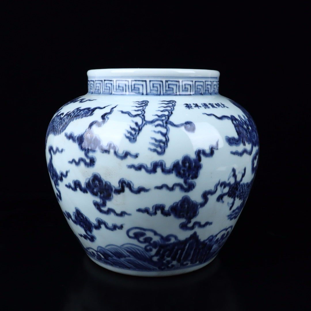 A pair of blue and white cloud dragon patterned jars