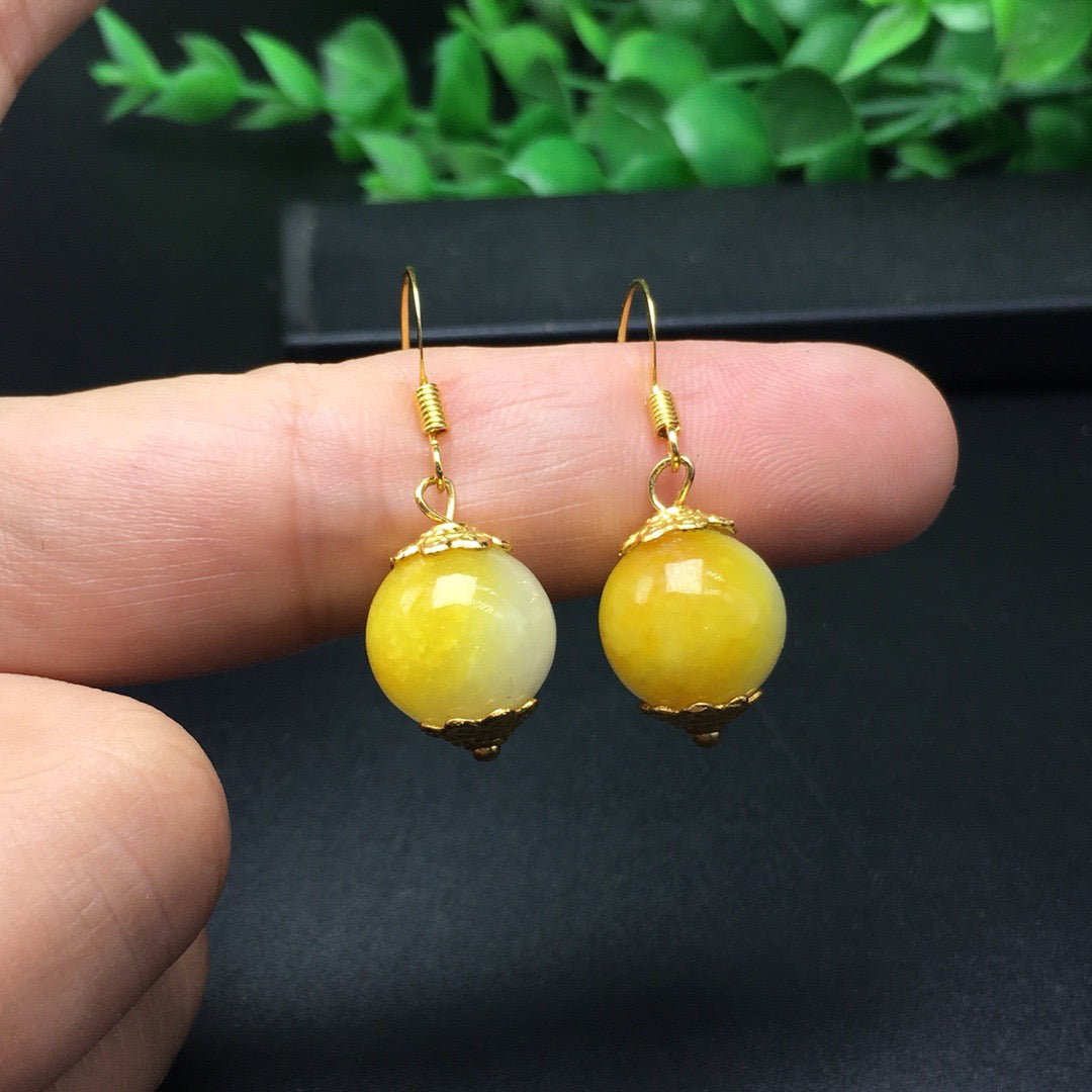 Sugar yellow round bead jade earrings