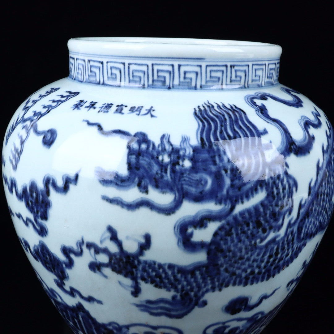 A pair of blue and white cloud dragon patterned jars