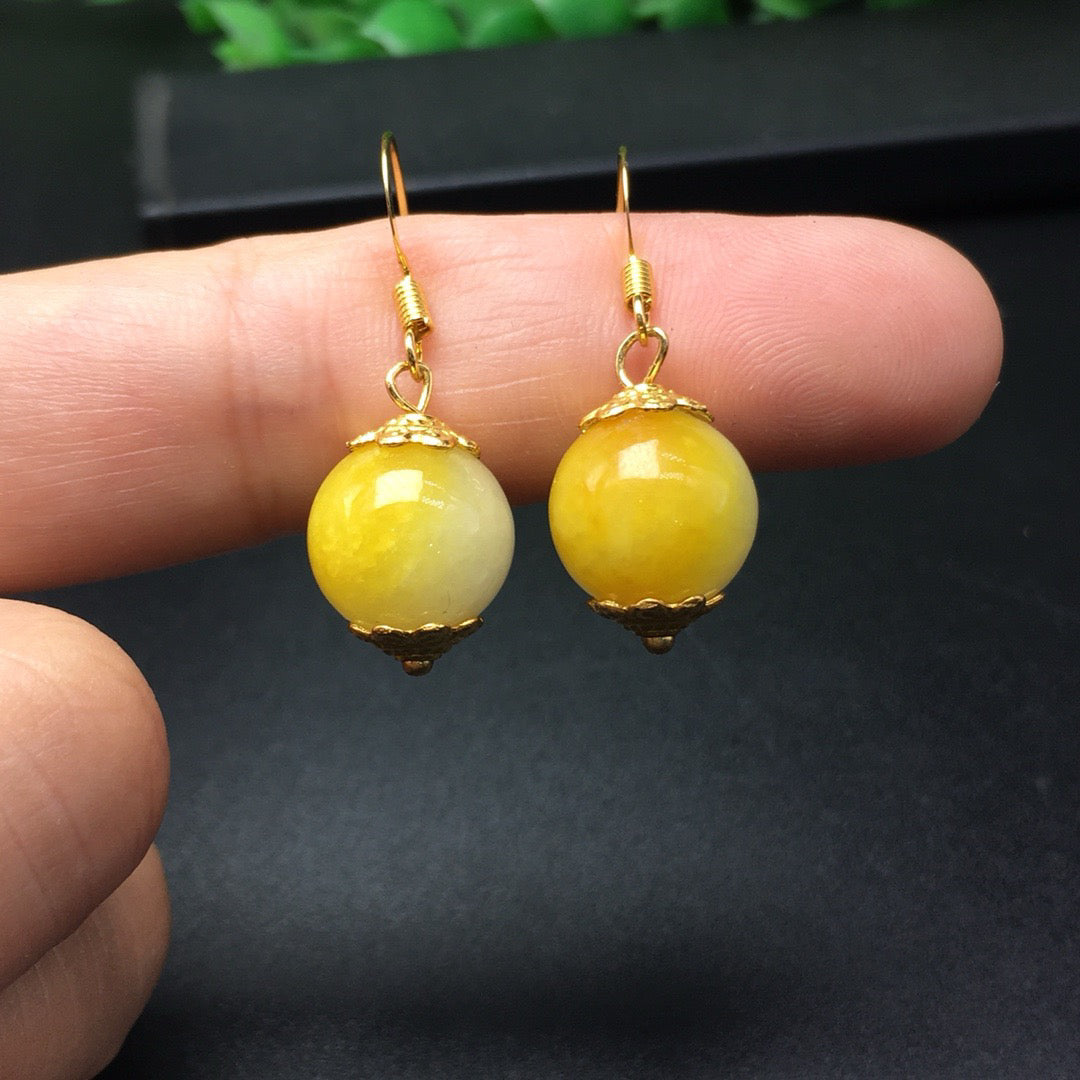 Sugar yellow round bead jade earrings