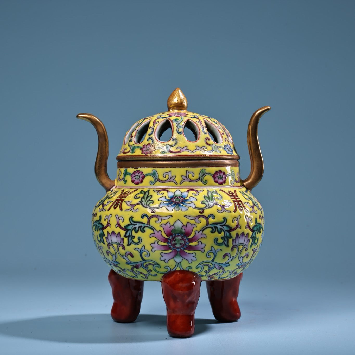 Hand painted enamel gilded gold colored porcelain incense burner