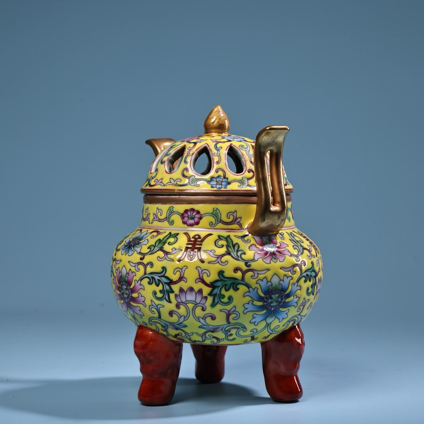 Hand painted enamel gilded gold colored porcelain incense burner