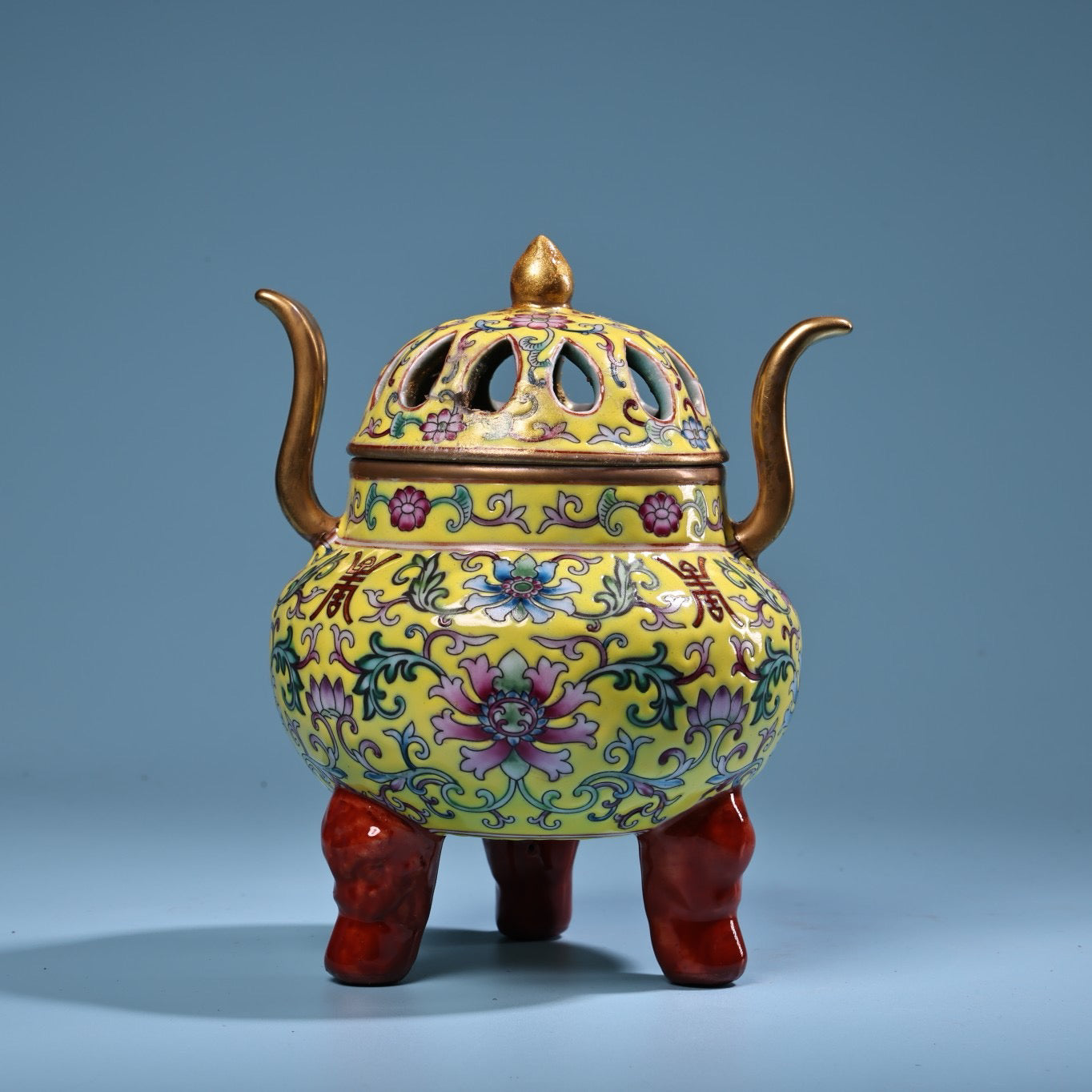 Hand painted enamel gilded gold colored porcelain incense burner