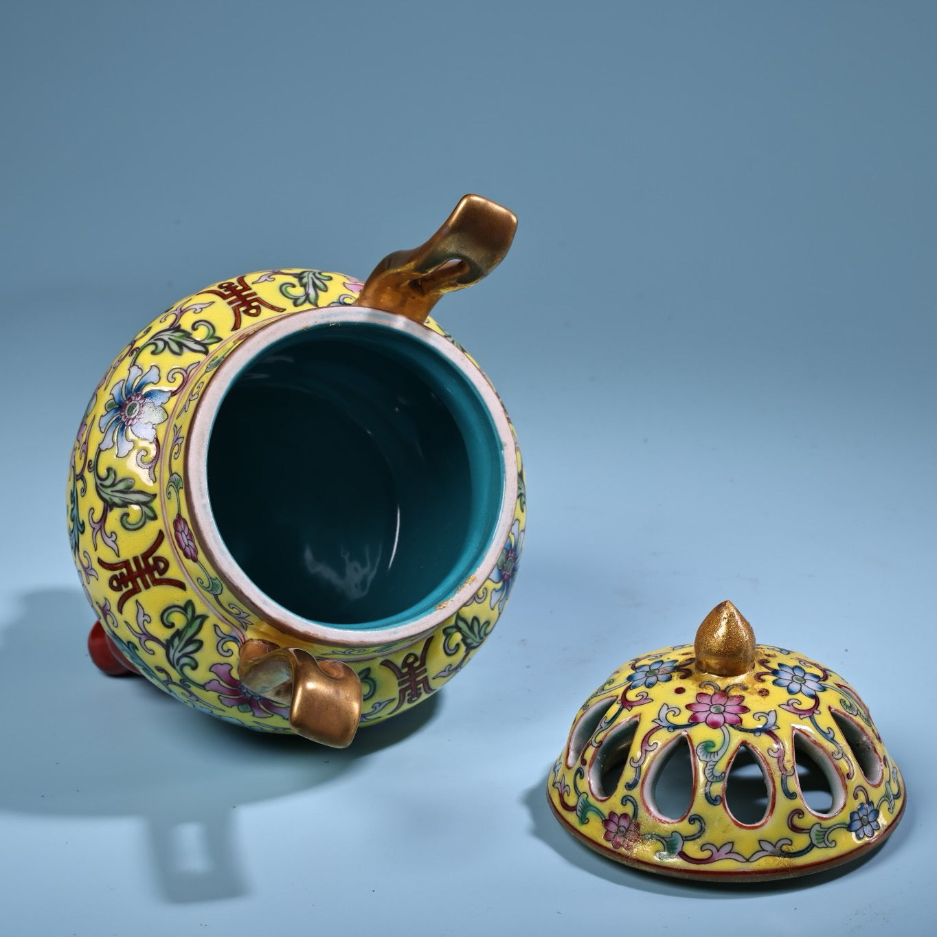 Hand painted enamel gilded gold colored porcelain incense burner