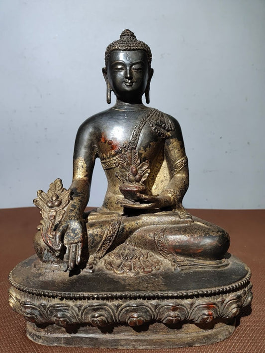 A statue of pure copper mud, gold sprinkled cinnabar Buddha, and Shakyamuni Medicine Buddha