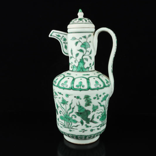 Green colored fish algae patterned teapot