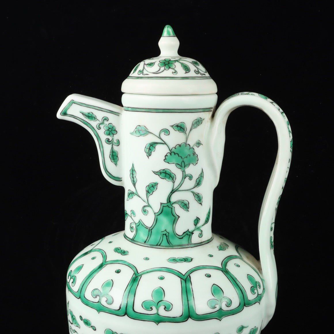 Green colored fish algae patterned teapot