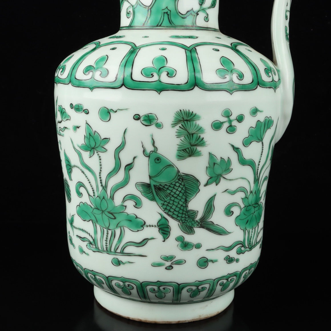 Green colored fish algae patterned teapot