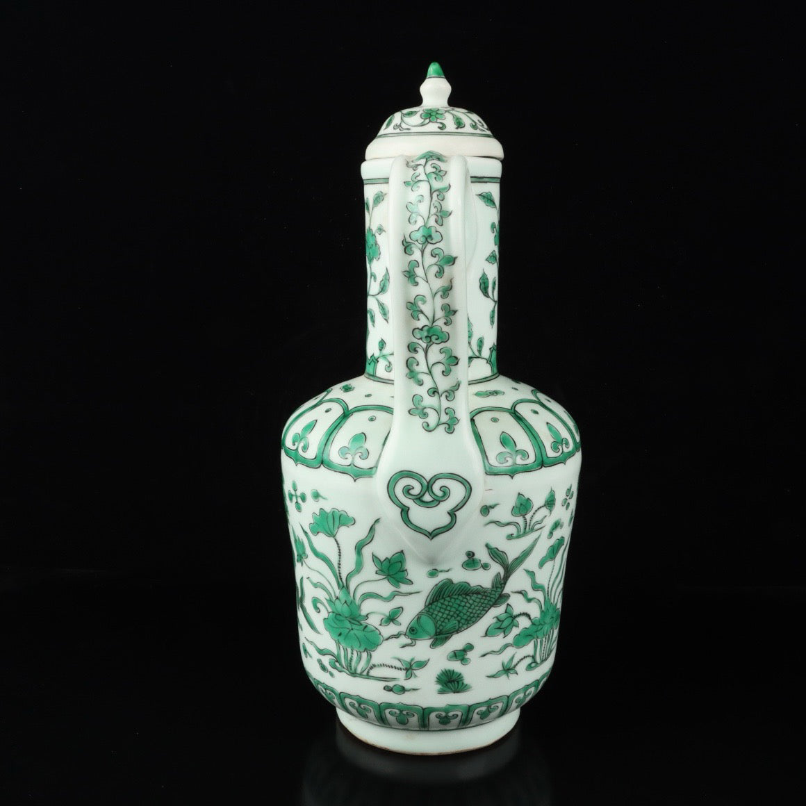 Green colored fish algae patterned teapot