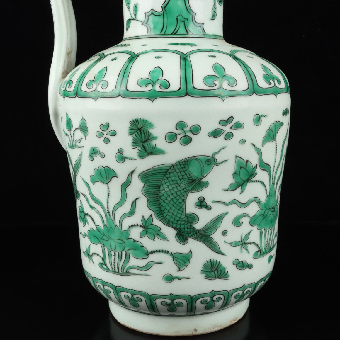 Green colored fish algae patterned teapot