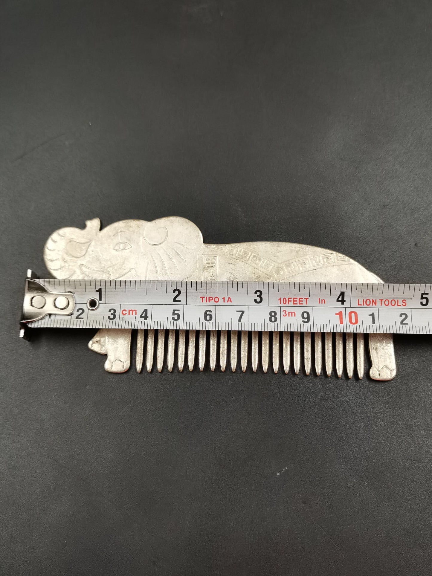 A Chinese antique silver comb