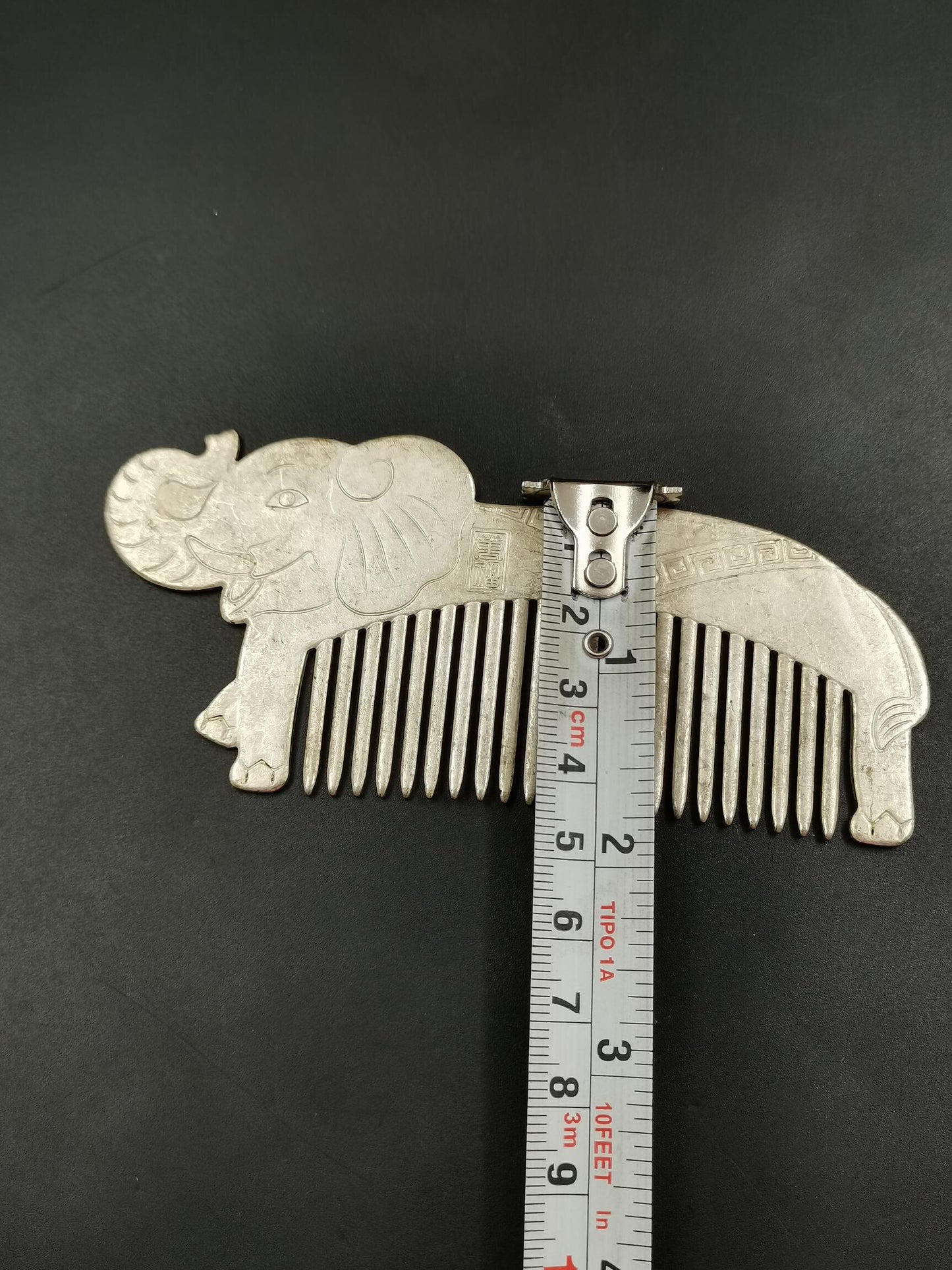 A Chinese antique silver comb