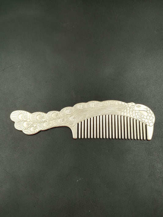 A Chinese antique silver comb