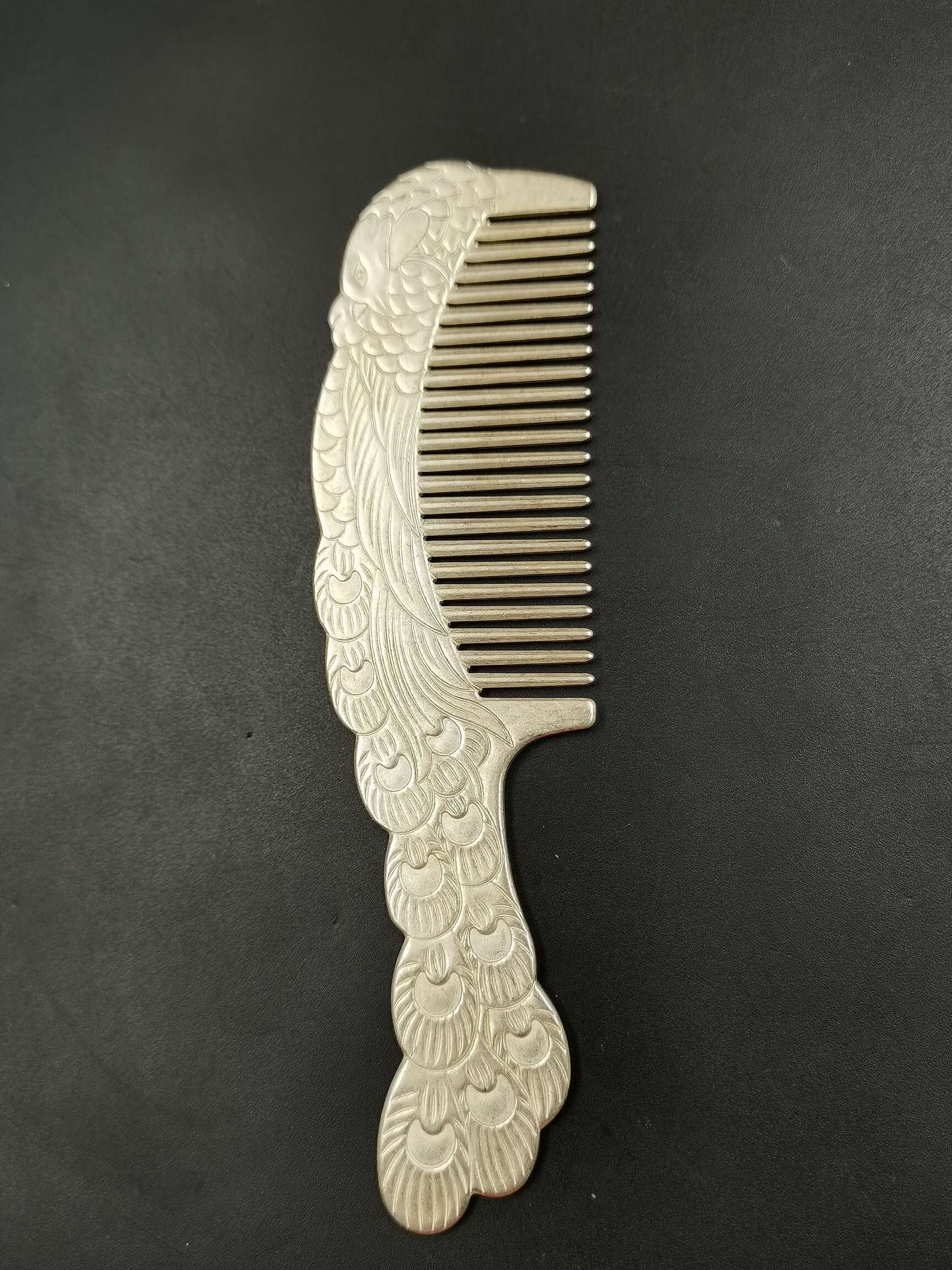 A Chinese antique silver comb