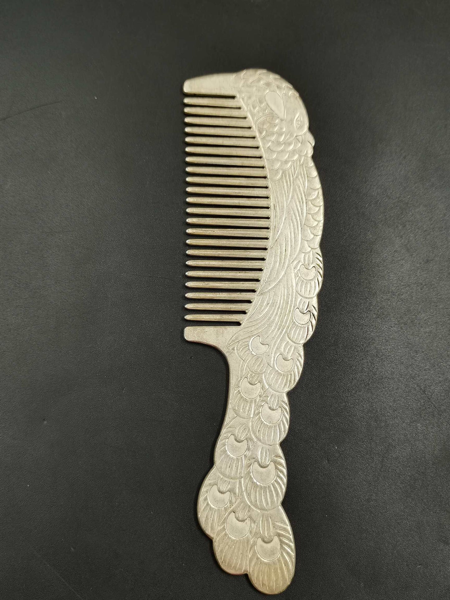 A Chinese antique silver comb