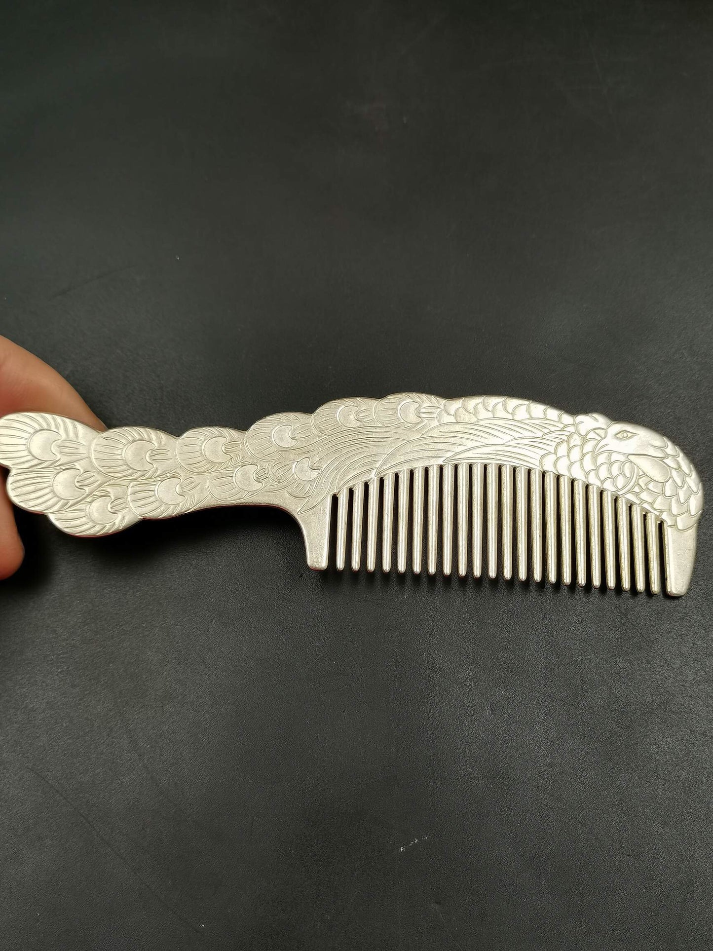 A Chinese antique silver comb