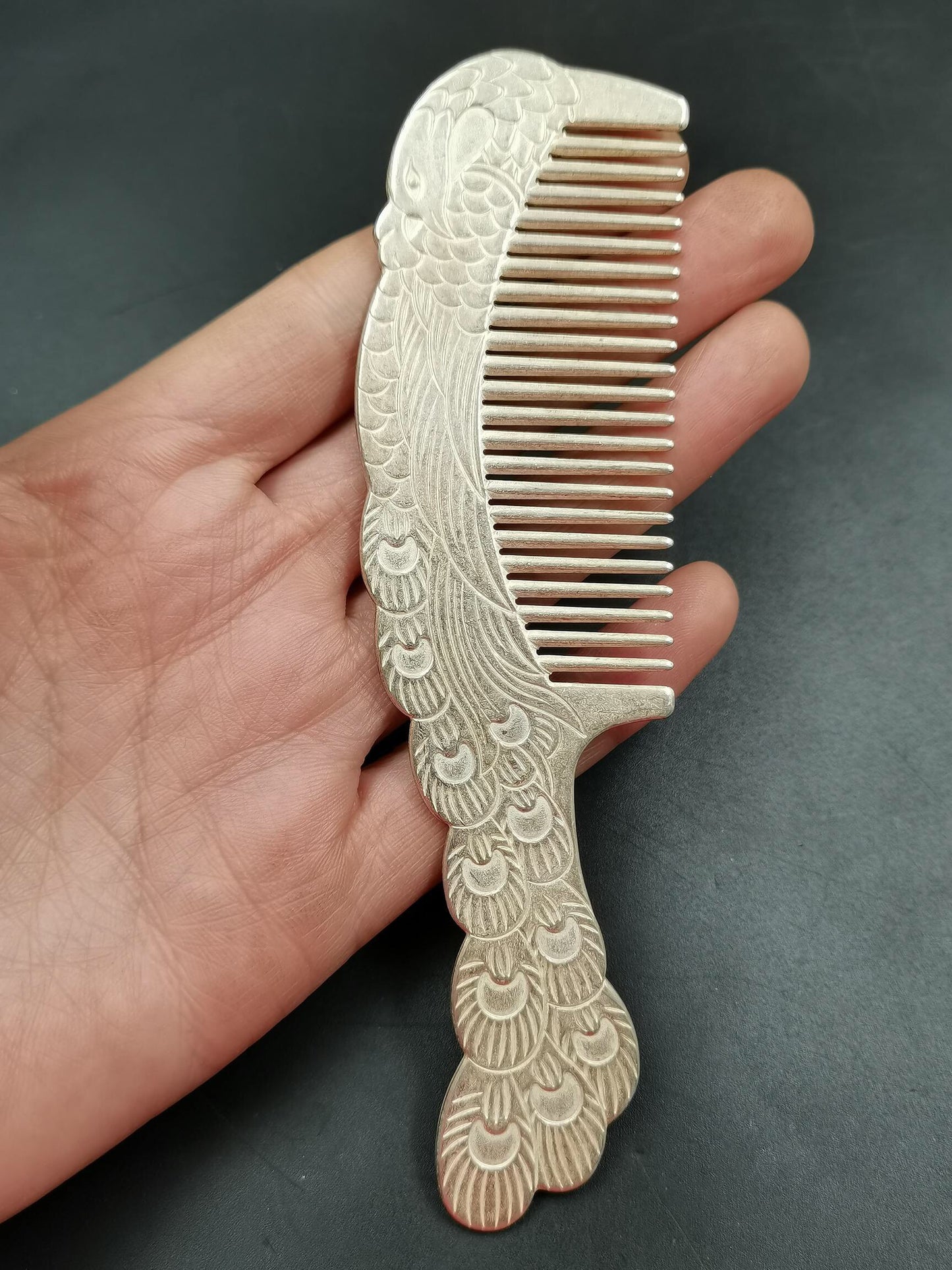 A Chinese antique silver comb