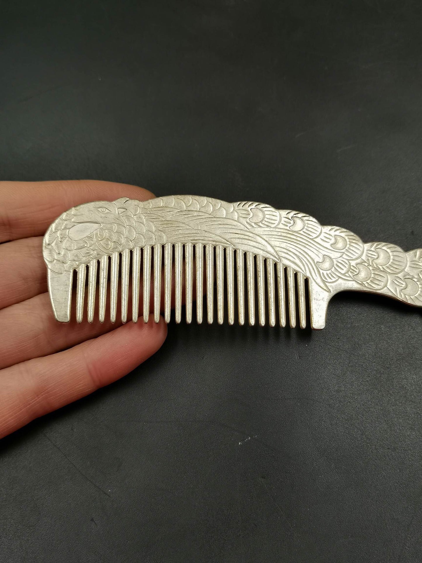 A Chinese antique silver comb