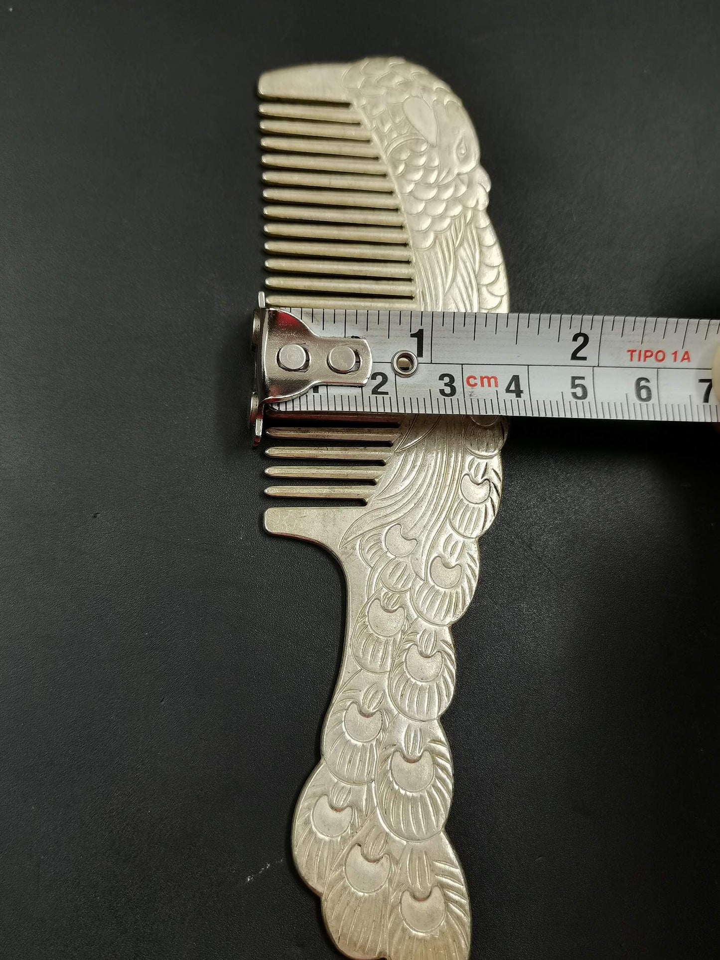 A Chinese antique silver comb