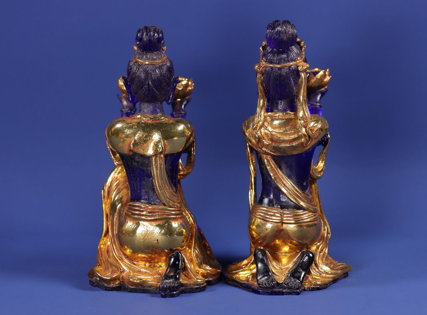 A pair of ancient Chinese glazed gold wrapped fairy candlestick ornaments