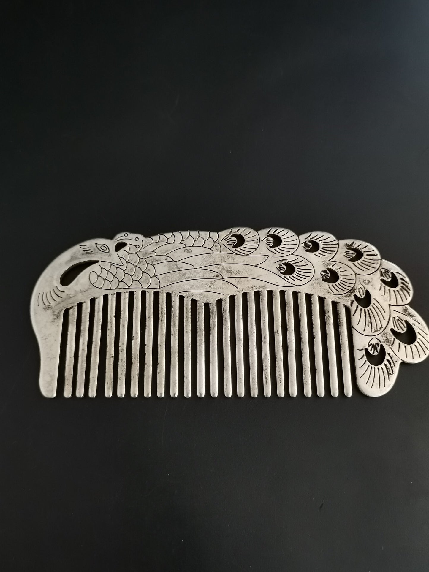 A Chinese antique silver comb