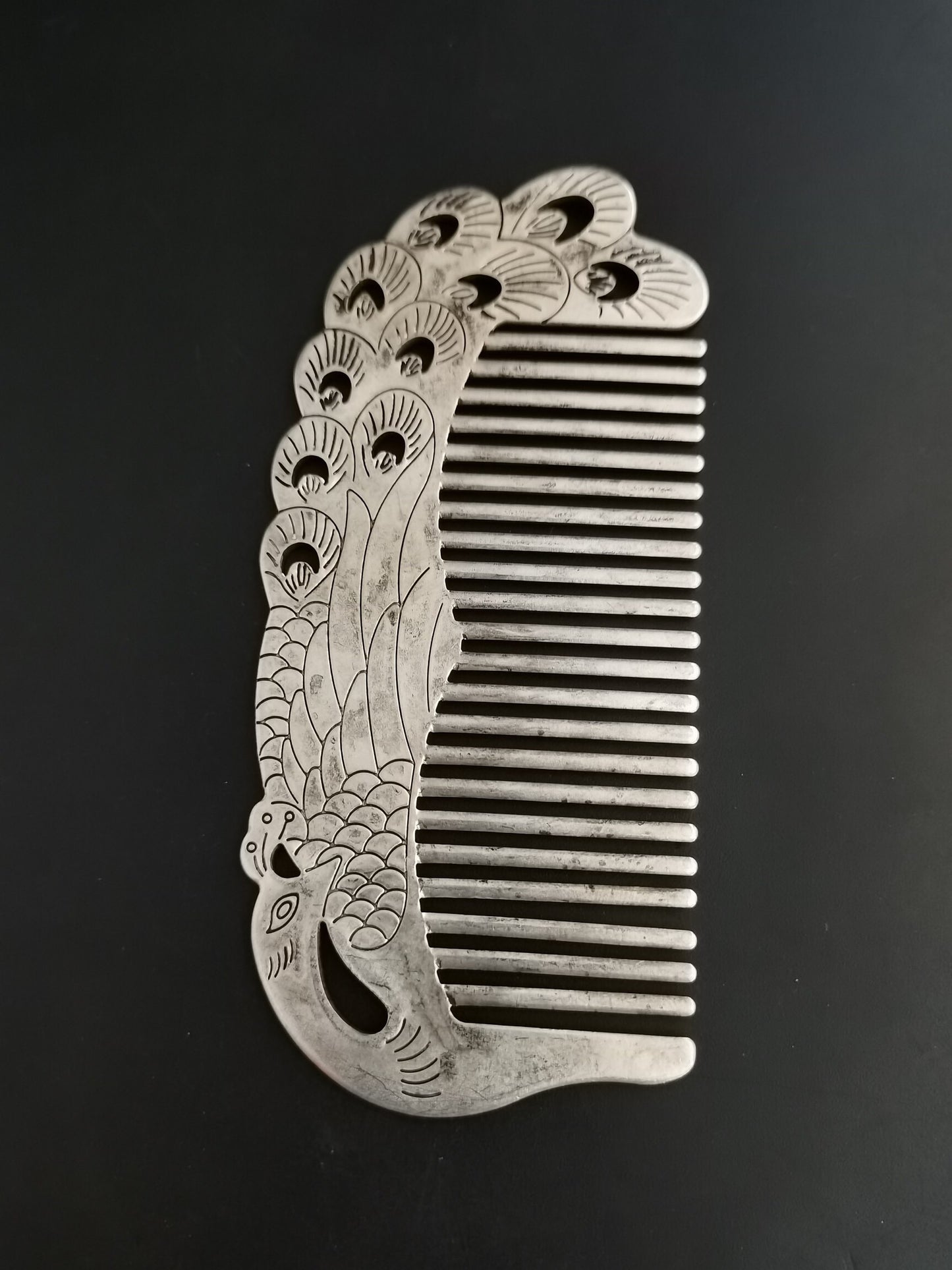 A Chinese antique silver comb