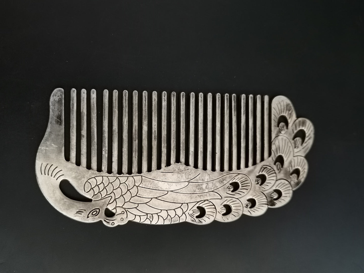 A Chinese antique silver comb