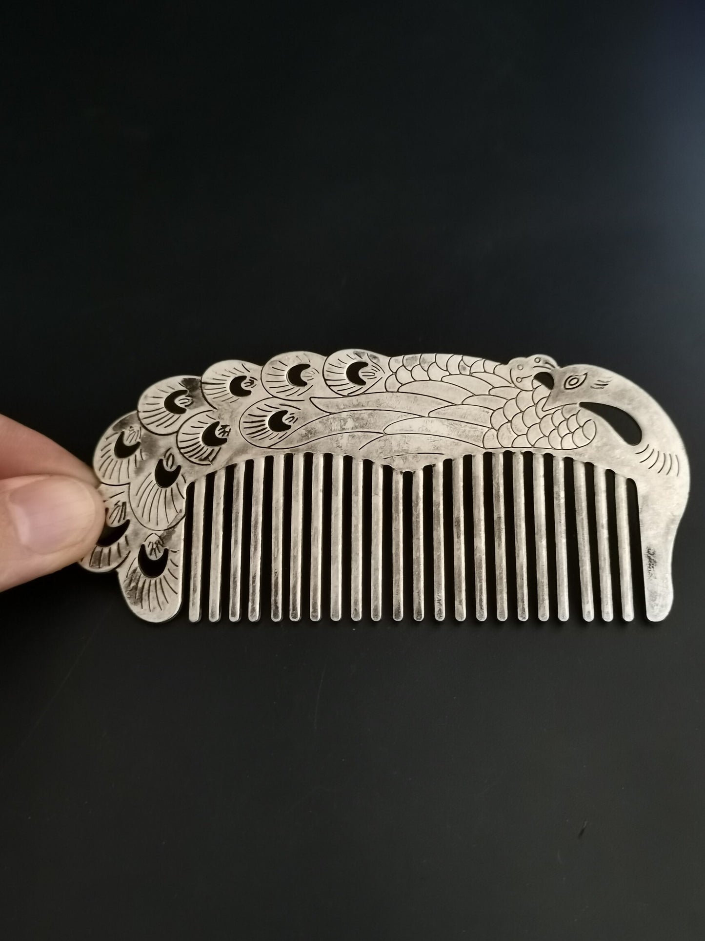 A Chinese antique silver comb