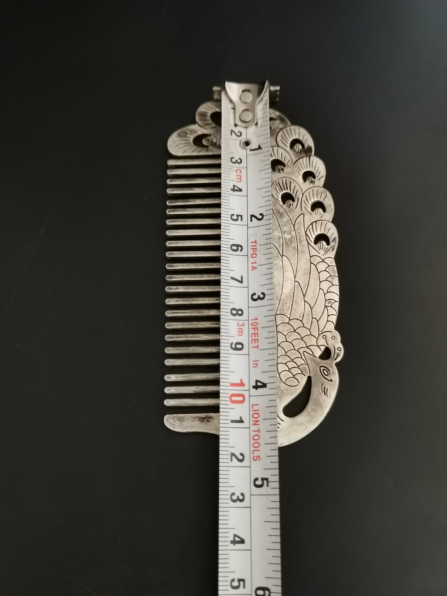 A Chinese antique silver comb