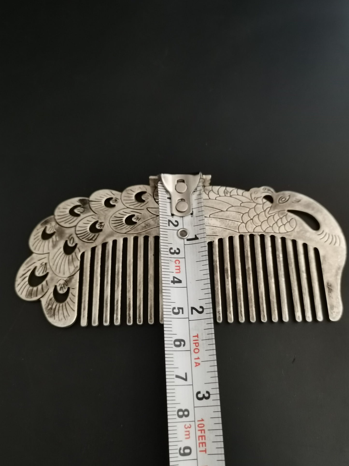 A Chinese antique silver comb