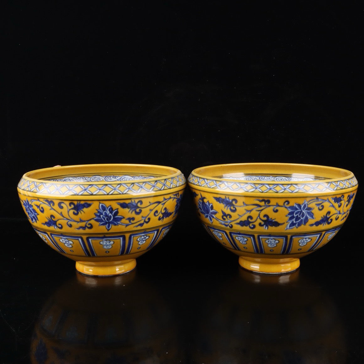 A pair of blue and white with yellow glaze and tangled branches and lotus pattern brush wash