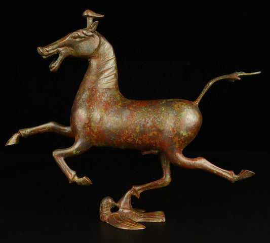 Chinese antique bronze horse steps on a flying swallow