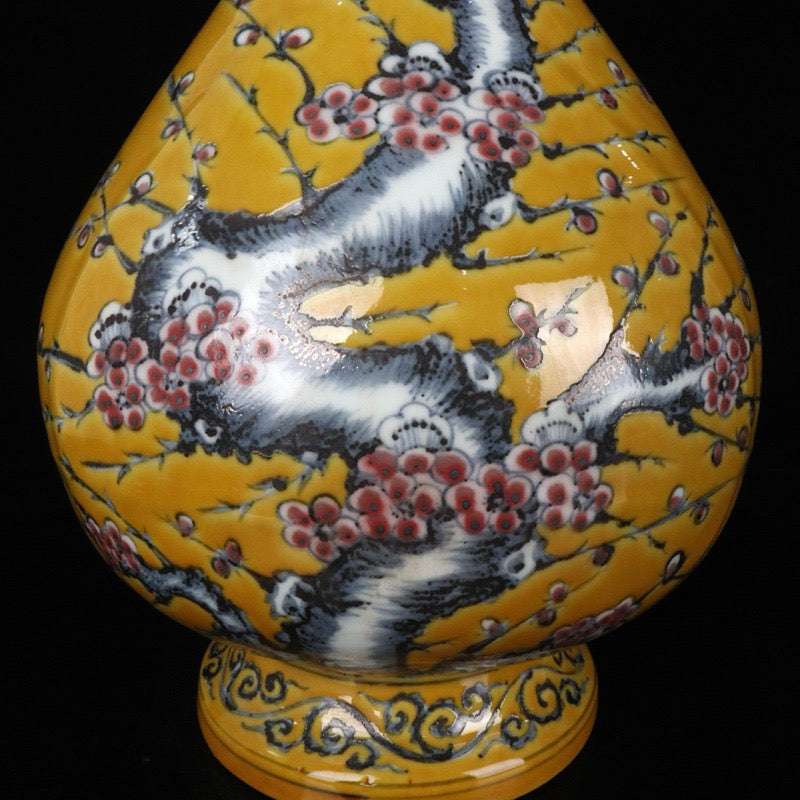 Blue and white glazed red plum blossom patterned double ear vase