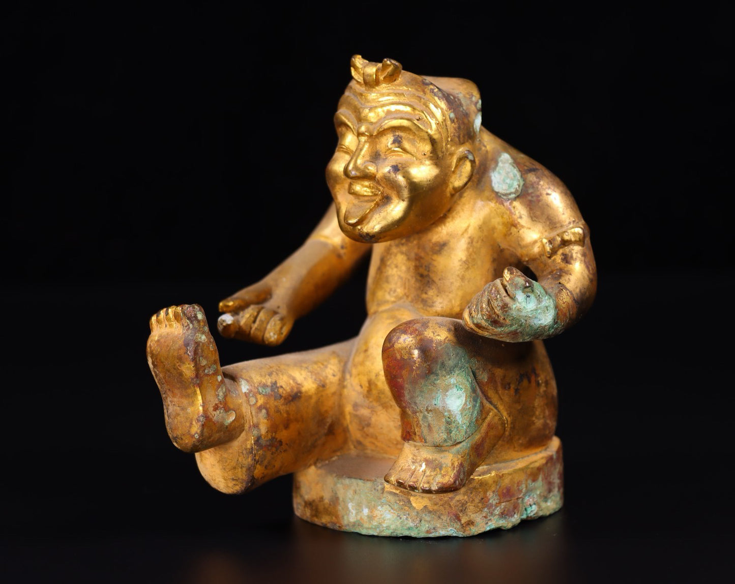 Chinese antique bronze gilded with red spots and green rust drummer