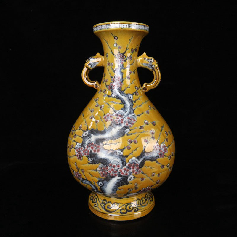 Blue and white glazed red plum blossom patterned double ear vase