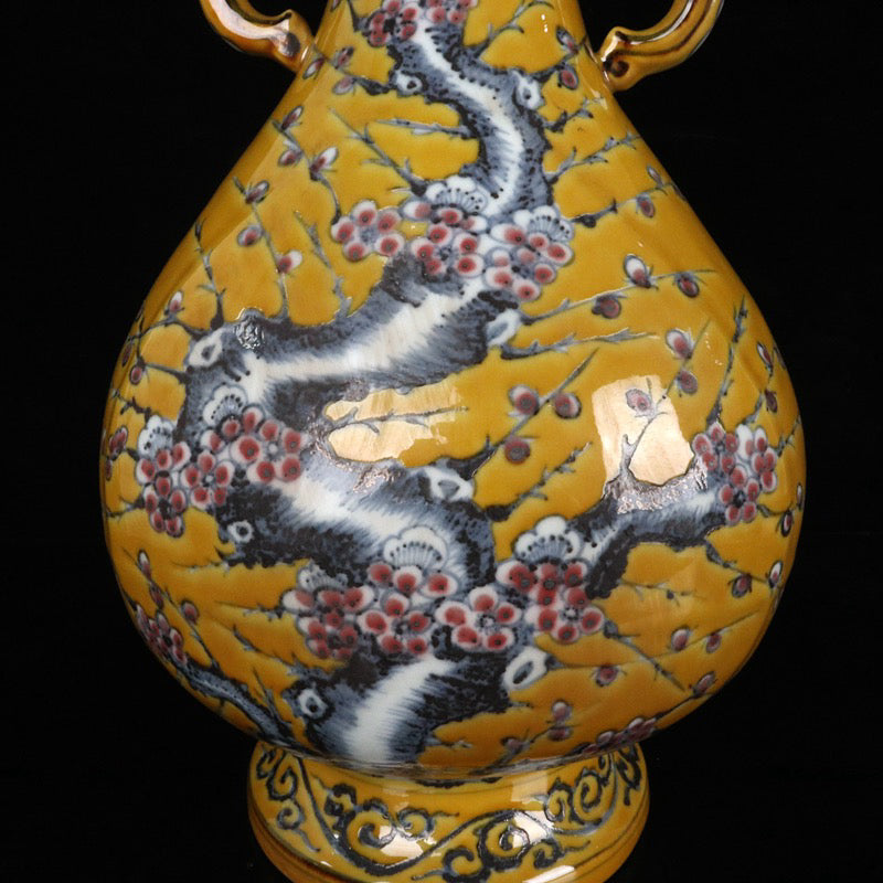 Blue and white glazed red plum blossom patterned double ear vase