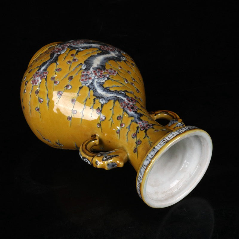 Blue and white glazed red plum blossom patterned double ear vase