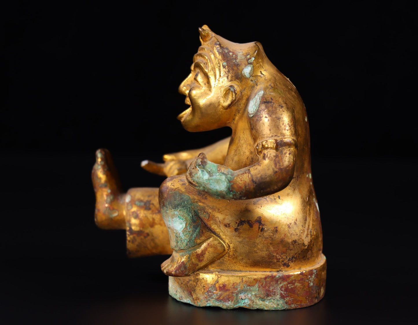 Chinese antique bronze gilded with red spots and green rust drummer