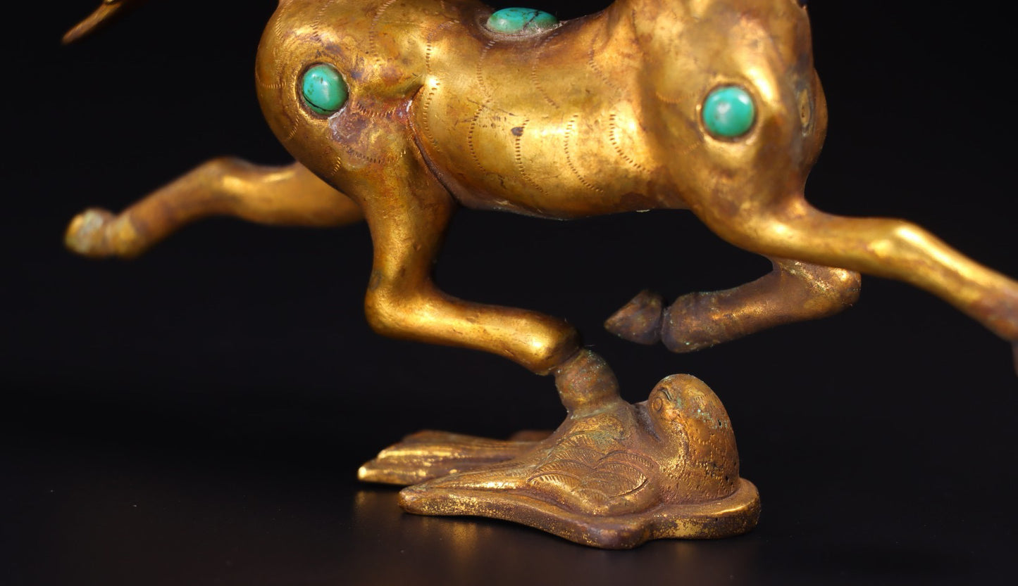Chinese antique handmade copper gilded gold inlaid with gemstones, horse treading on a flying swallow