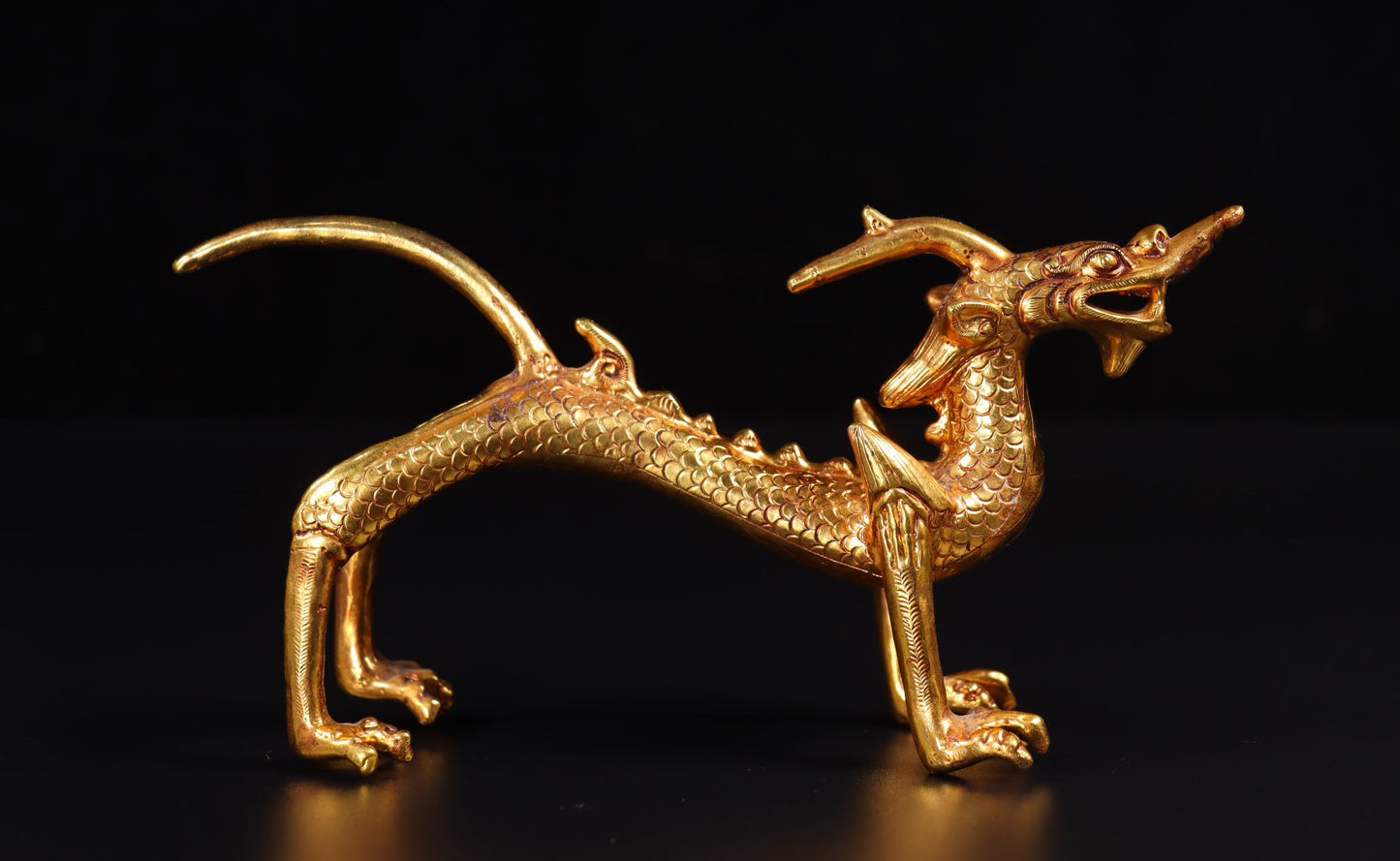 A pair of Chinese antique handmade copper gilded gold high relief carved dragons