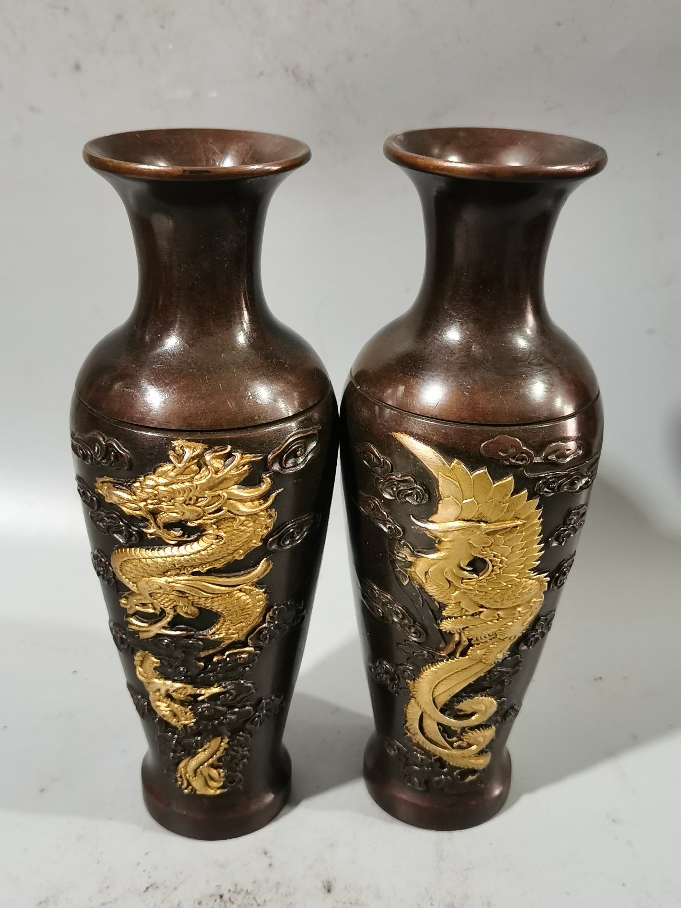 A pair of Chinese antique pure copper dragon and phoenix auspicious vases