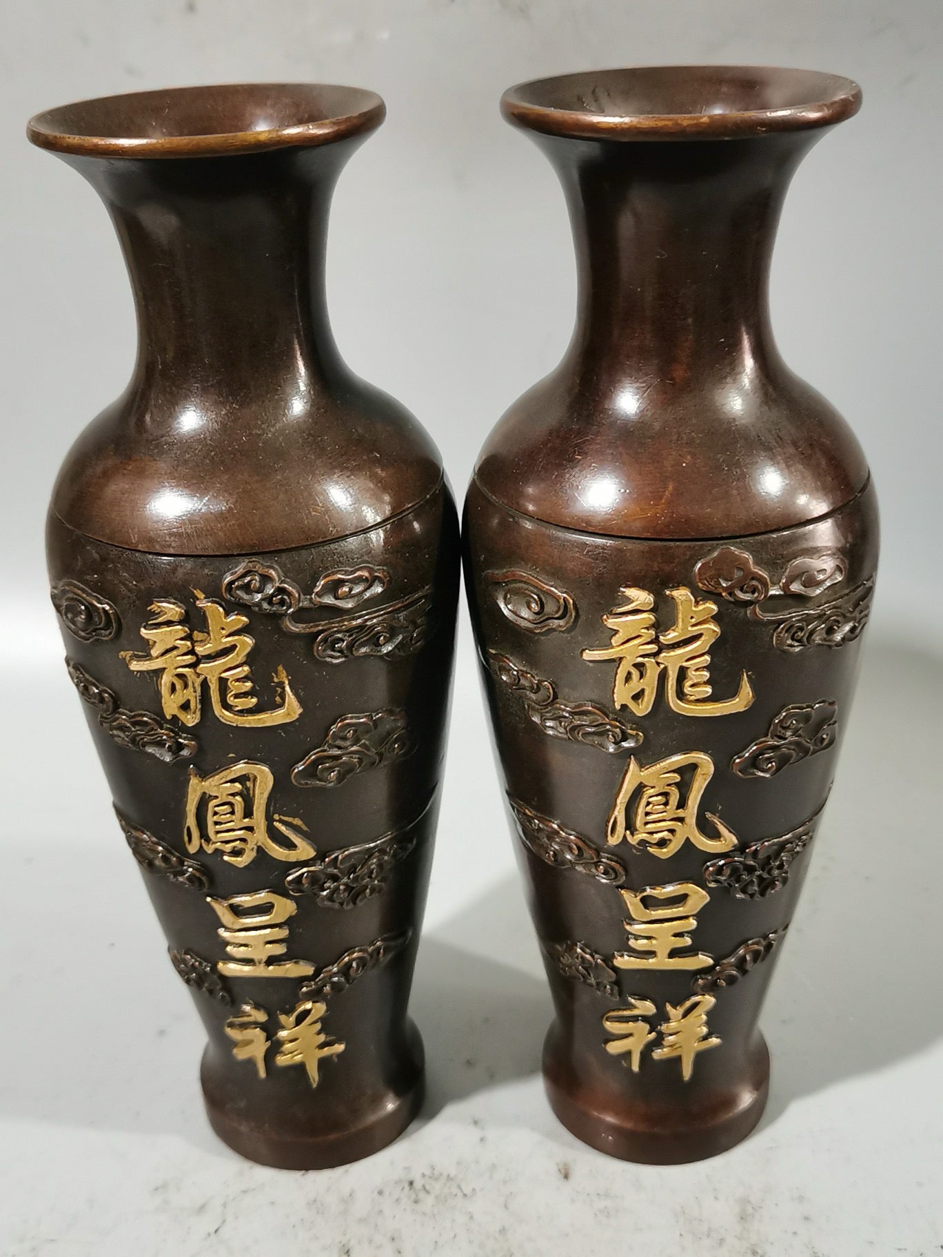 A pair of Chinese antique pure copper dragon and phoenix auspicious vases