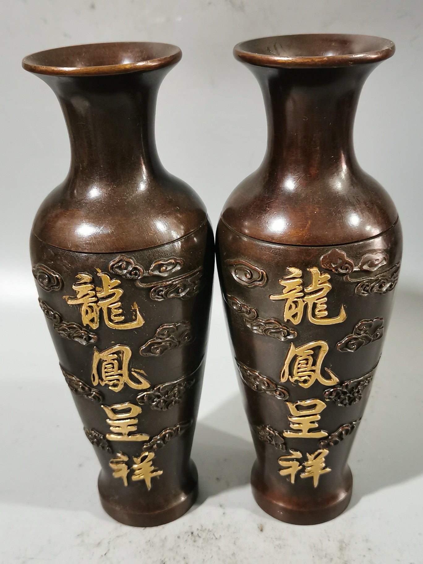 A pair of Chinese antique pure copper dragon and phoenix auspicious vases