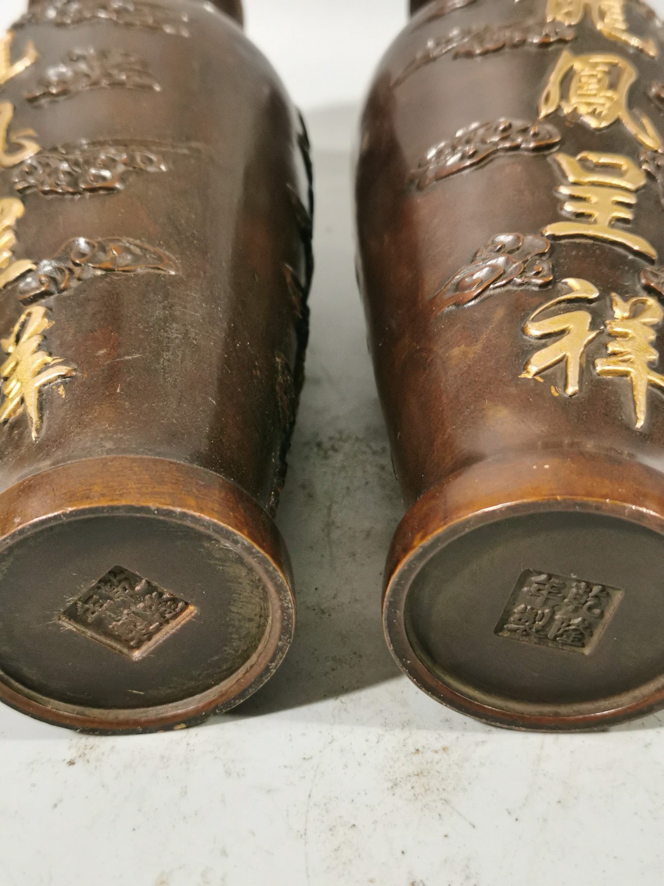 A pair of Chinese antique pure copper dragon and phoenix auspicious vases