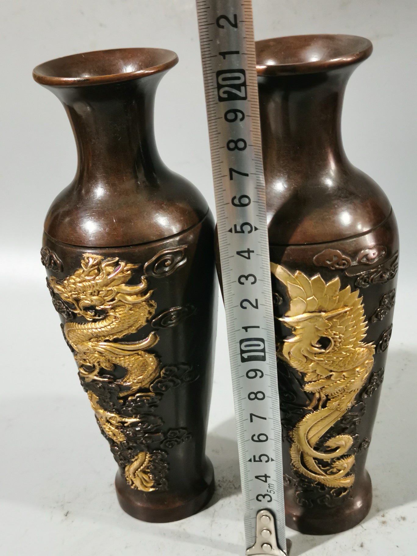 A pair of Chinese antique pure copper dragon and phoenix auspicious vases