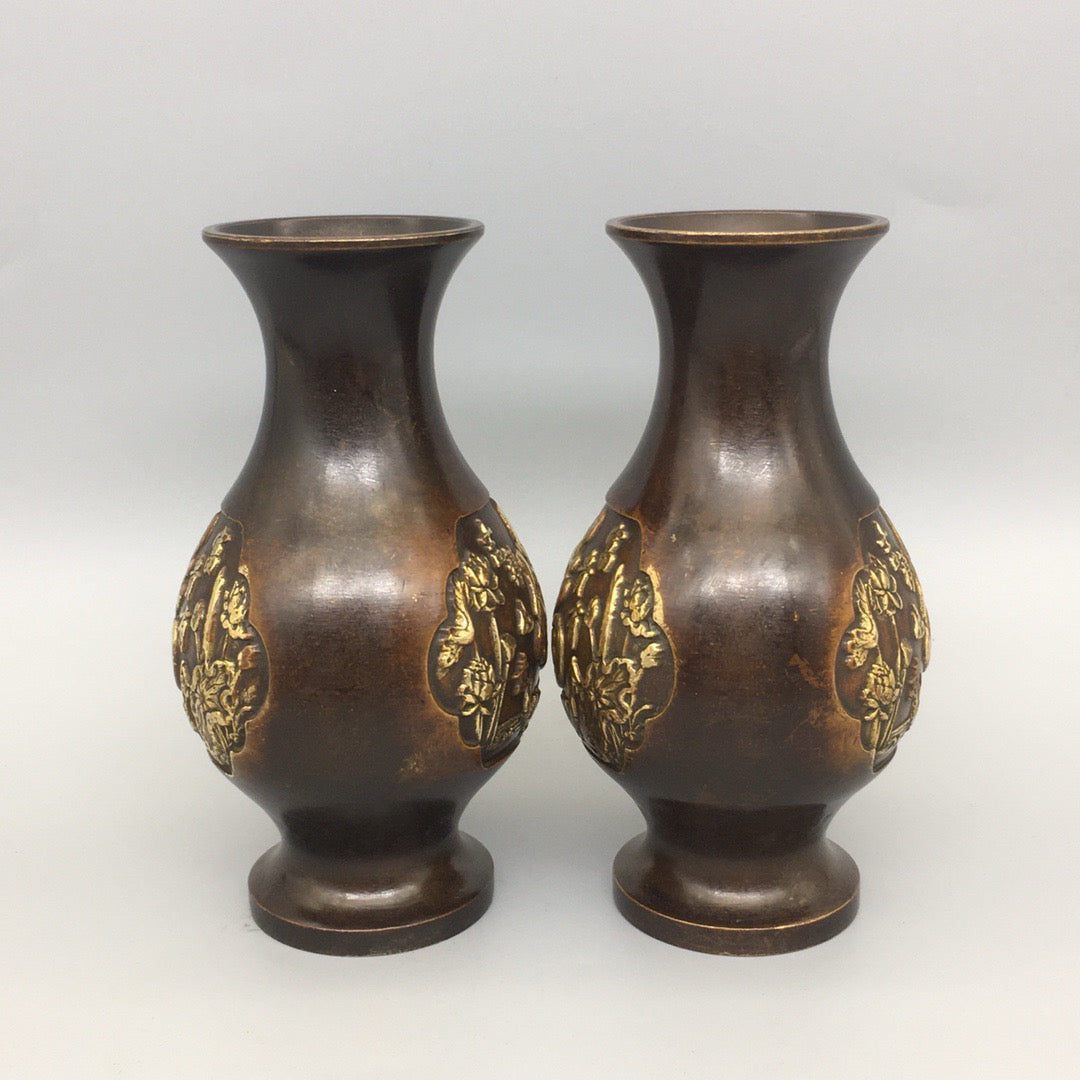 A pair of Chinese antique pure copper lucky character vases