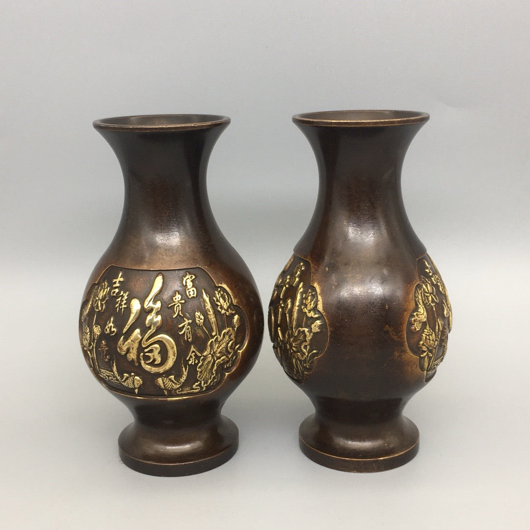 A pair of Chinese antique pure copper lucky character vases